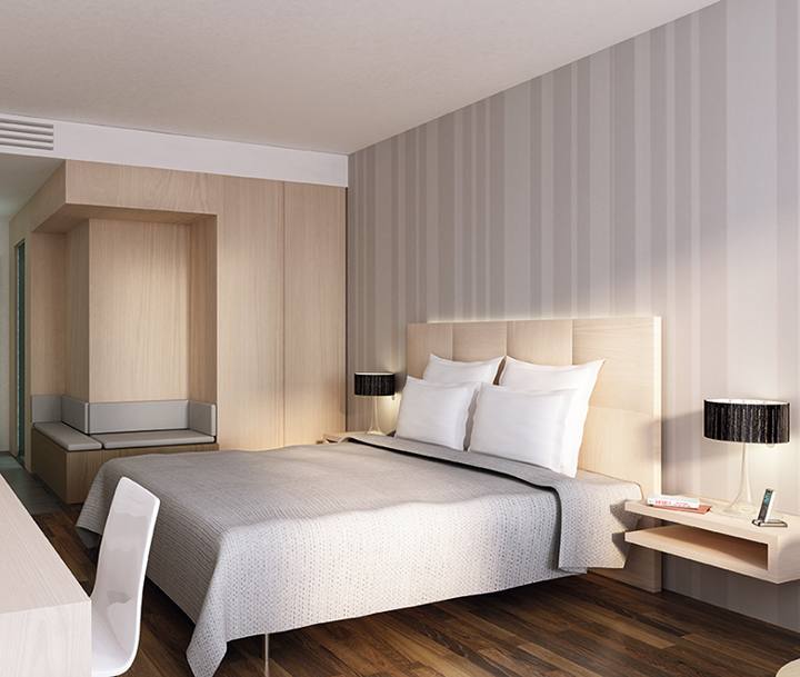 Modernes Hotelzimmer mit Doppelbett